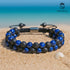 Unisex Armband aus Lavastein und Lapis Lazuli auf Sand am Meer – spirituelles Schmuckstück mit maritimer Energie von UNIQAL